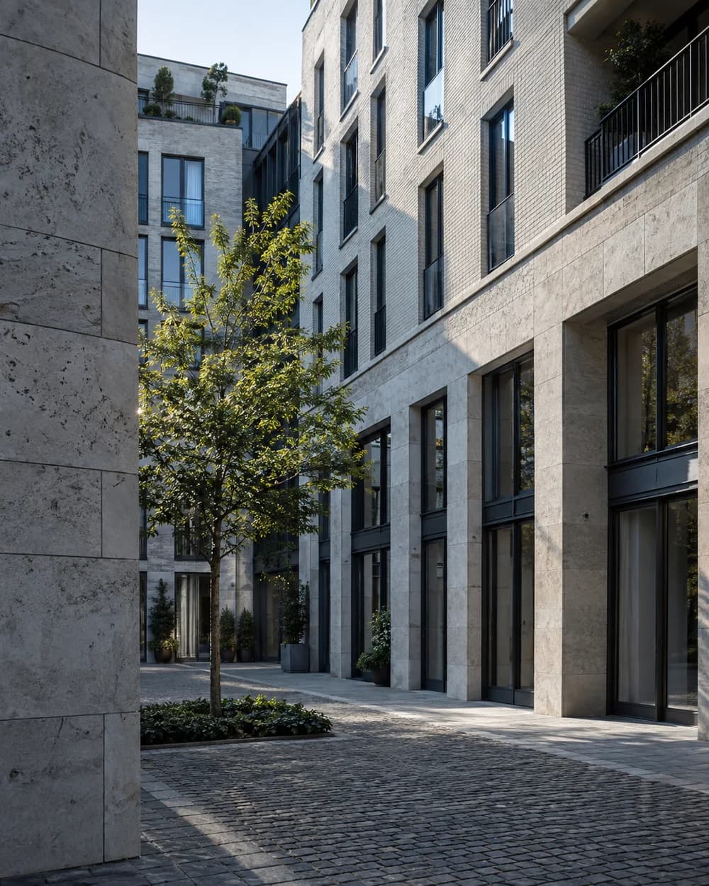 Moderne Immobilien in einem begrünten Innenhof